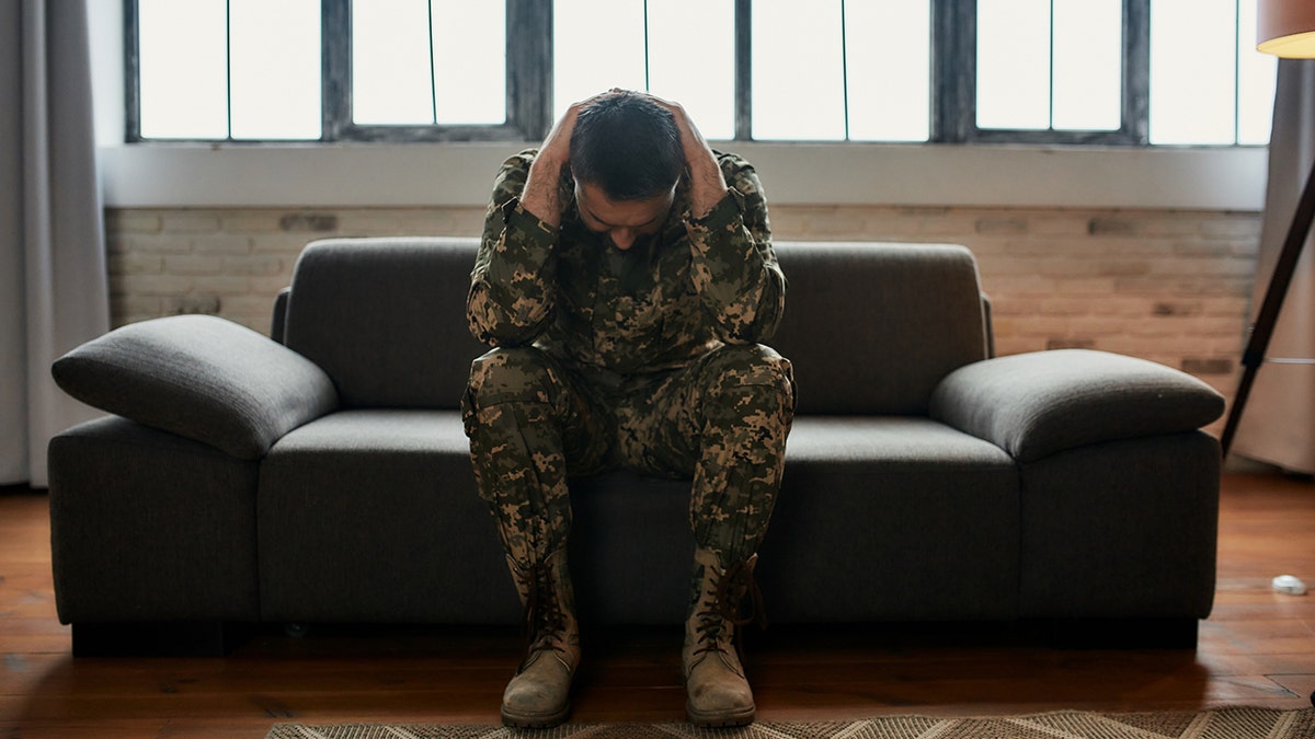 Veteran who experience PTSD on a sofa